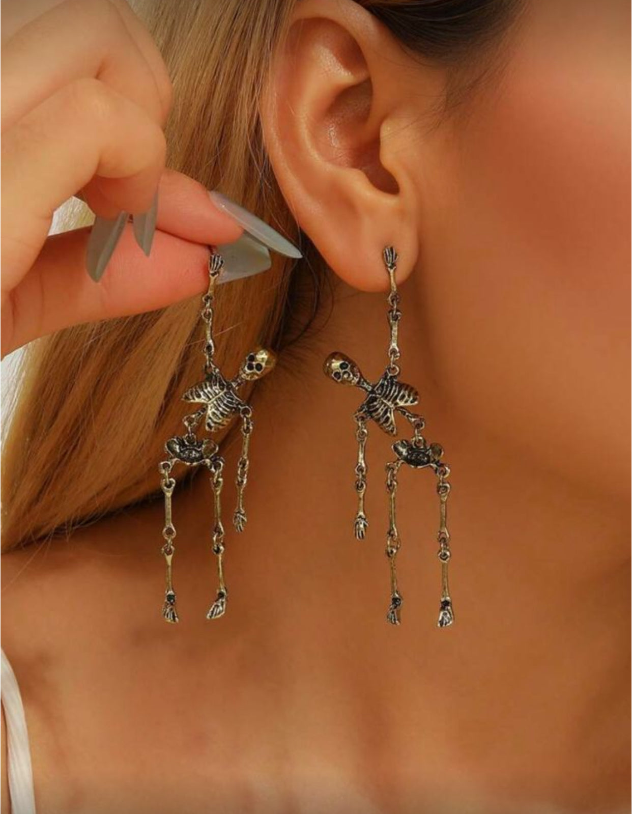 Par de aretes esqueletos