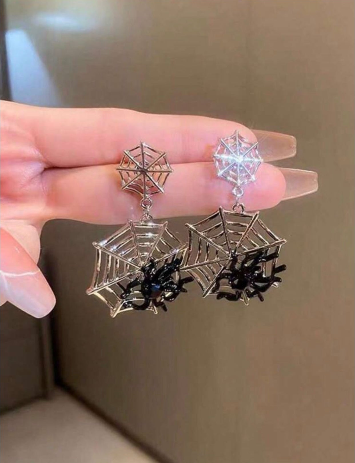 Aretes telaraña plateada