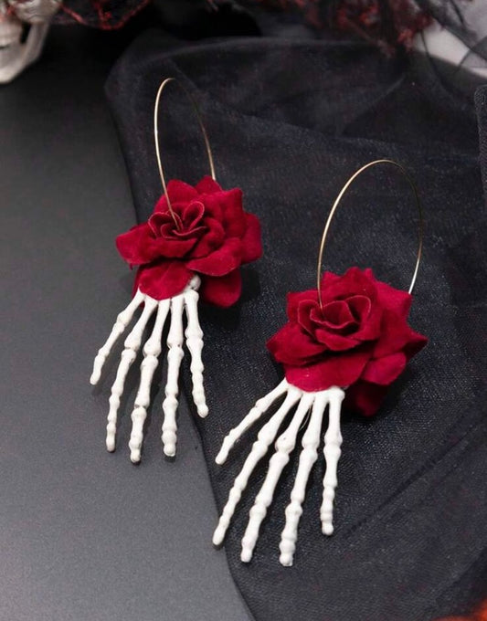 Argollas mano y rosa