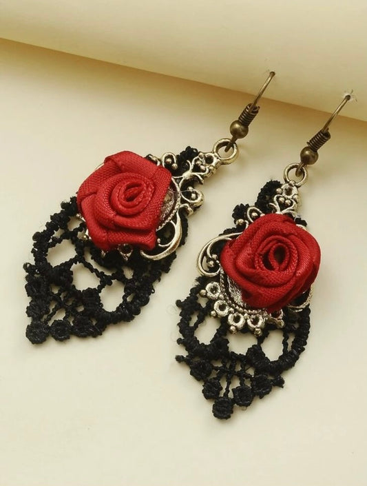 Aretes tejidos con rosa